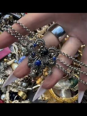 Ornate Silver Necklace with Blue Stone Accents